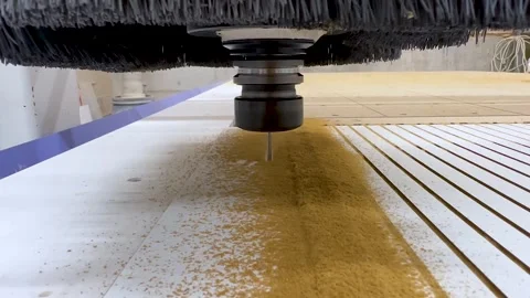Close-up of the milling process of MDF, particleboard, and plywood on a CNC Stock Footage 276329626