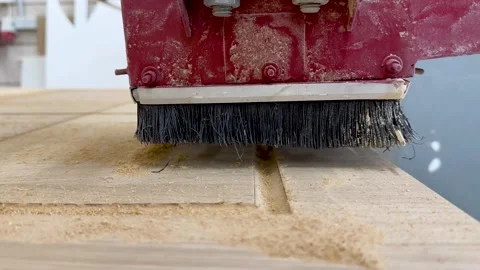 Close-up of the milling process of MDF, particleboard, and plywood on a CNC Stock Footage 276329686
