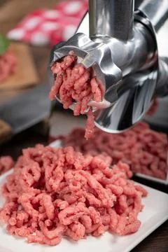 Close-up of a minced meat in grinder Stock Photos