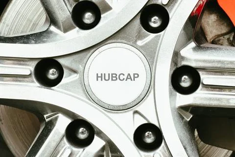 Close up a mini hubcap cover of car wheel, hubcap cover in a wheel hub. Stock Photos