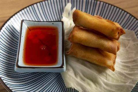 Close up of mini prawn spring rolls. Oriental kitchen Stock Photos
