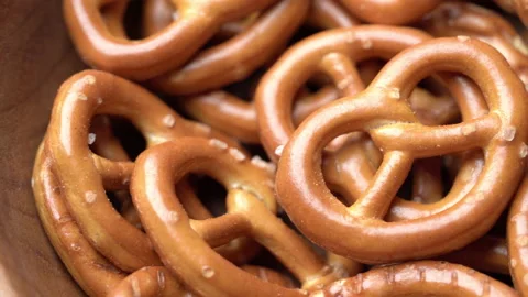 Close up mini-salted pretzels background tracking shot Stock Footage 150270390