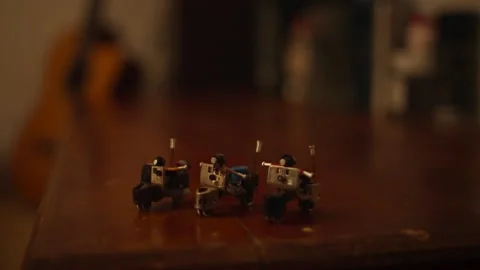 Close Up of Miniature Motorcycle Model on Table Stock Footage 344235771