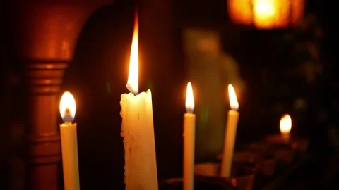 Close up minimal view to the candle stick with fire light for praying bless.. Vidéo 235003902
