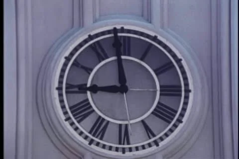 Close-up of minute hand on wall clock moving to 9 o'clock 스톡 동영상 11366253