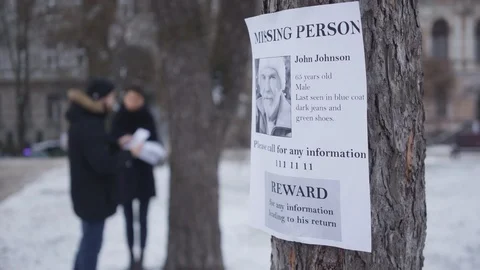 Close-up of missing person ad with information about lost senior Caucasian man Video stock 123008660