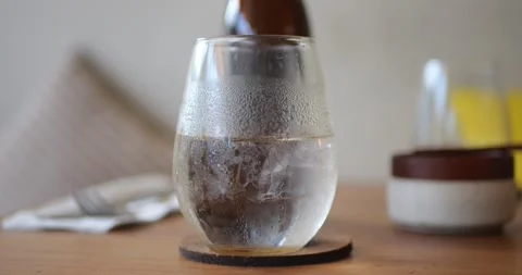 A close-up of a misted clear glass on a cafe table. 库存影片 279736298