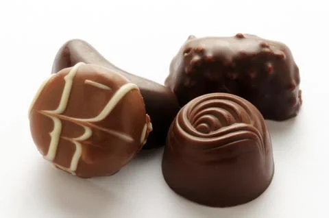 Close up on mixed chocolates. Stock Photos