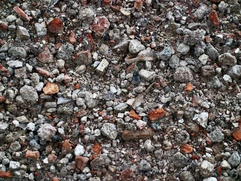 Close-up of mixed rubble and crushed bricks on the ground Stock Photos