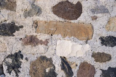 Close-up of mixed stone wall texture Foto stock