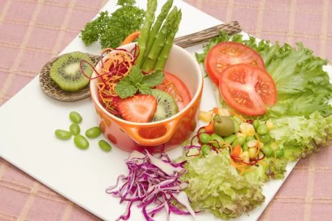 Close up of mixed vegetable and fruit salad,healthy food Stock Photos