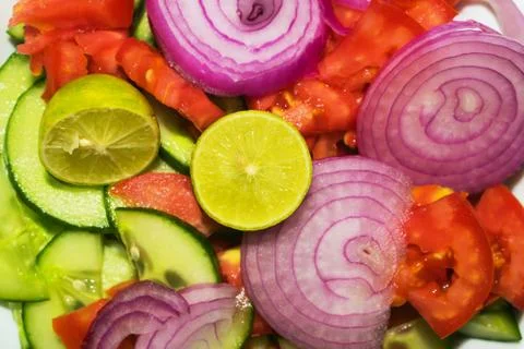 Close up of mixed vegetable salad isolated Stock Photos