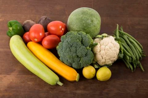 Close up of  Mixed Vegetable Shot in Studio Isolated on Wooden Background Stock Photos