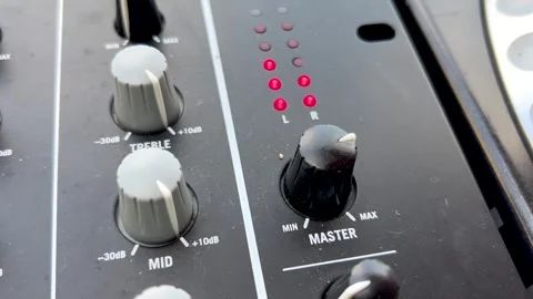 Close up mixer and equalizer volume on the DJ mixer amplifier Stock Footage 297884044