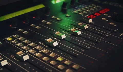 Close up at a mixer, DAW studio controller. Stock Photos