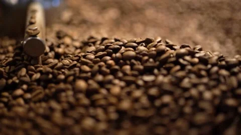 Close-Up Of Mixing And Stirred Quality Black Coffee Beans In Roasting Machine Stock Footage 180469219