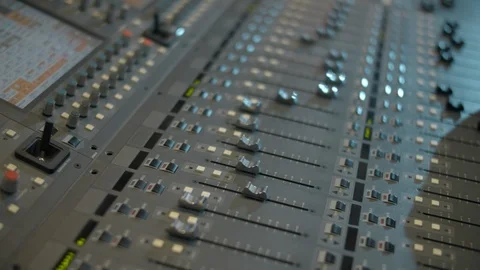 Close-up of a mixing console, automatic faders. Sound director works in the Video stock 116040295