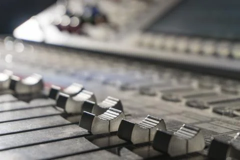 Close-up of mixing console, music equalizer in sound recording Studio Stock Photos