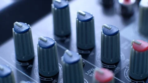 Close-up Mixing console. Tilt up on the mixing console. Macro of switches. Stock Footage 106567190