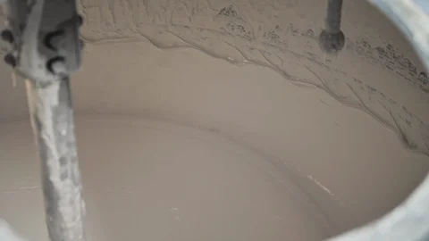 Close up of mixing toothpaste in a large  steel production container. Stock Footage 128455294