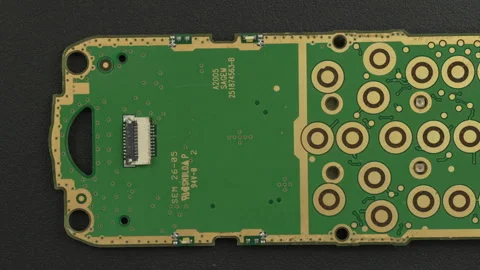 Close-Up of Mobile Phone Circuit Board with Button Contacts Stock Footage 337009244