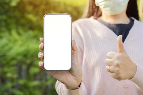 Close-up of mobile phone with isolate screen holding by woman wearing medic.. Stock Photos