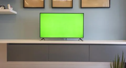 Close-up mock-up copy spase screen TV chroma key cozy modern living room Stock Photos