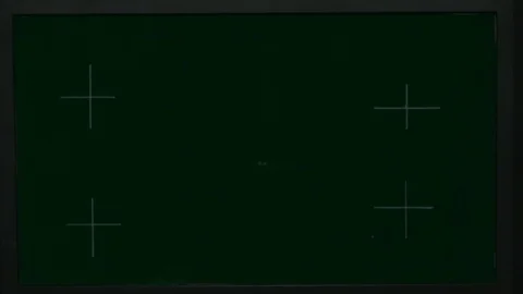 Close up of Mock-up Green Screen Modern TV in dark studio on wooden pallets and Video stock 110770175