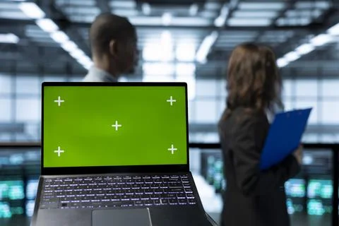 Close up of mockup chroma key notebook used by admins in server farm 写真素材