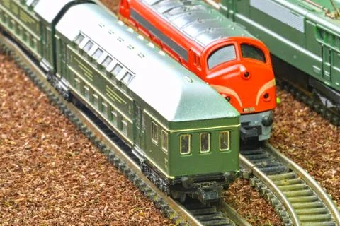 Close-up of model railway carriage on the rail tracks. Perfect model of the Stock-Fotos
