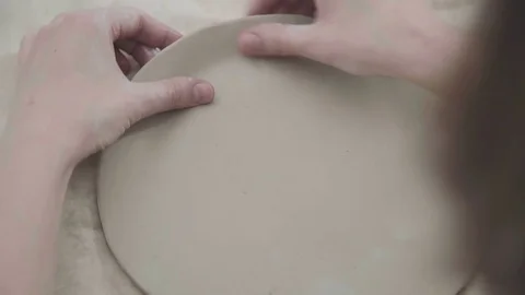 Close-up of modeling clay, the process of creating ceramic plates Stock Footage 73228363