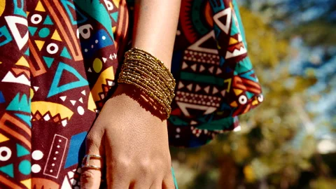 A close up of a model's hand wearing an accessories dressed in a South African s Video stock 184607017