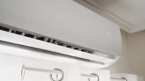 Close-up of modern air conditioner activating and automatically lowering it.. Stock Footage 342762661