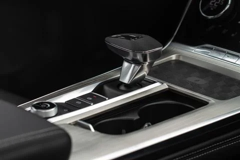 Close up of the modern automatic gearbox lever. Automatic transmission shift  Stock Photos