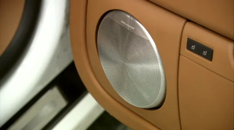 Close up of modern beige leather car interior,  Bang and Olufsen Sound System Stock Footage 49201121