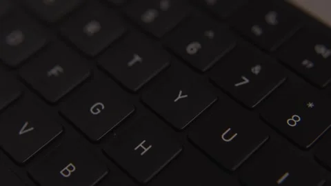 Close-up of modern black computer keyboard keys, minimalistic design, technology Stock Footage 317951909