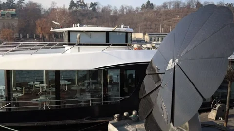 A close-up of a modern boat with a large solar panel on the side. The camera cap Stock Footage 303286134