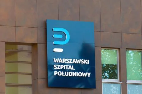 A close-up of the modern building facade and official signage for the South.. Stock Photos