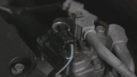 Close-up of Modern Car Engine Components and Electrical Sensors 動画素材 336722742