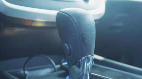 Close-up of a modern car gear shift lever 動画素材 335903724
