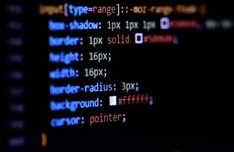 Close-up of modern CSS3 cascade style sheet programming code for HTML coding. Stock Photos