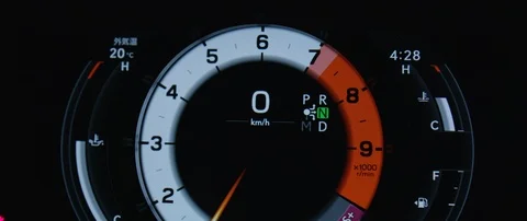 Close up of modern digital light up speedometer speeding up Stock Footage 124657237