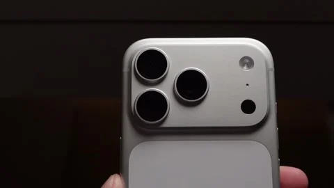 Close-up of Modern Flagship Smartphone Triple Camera Module Stock Footage 329568122