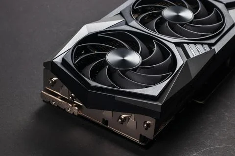 A close up of a modern GPU Graphic card on dark background. Stock Photos