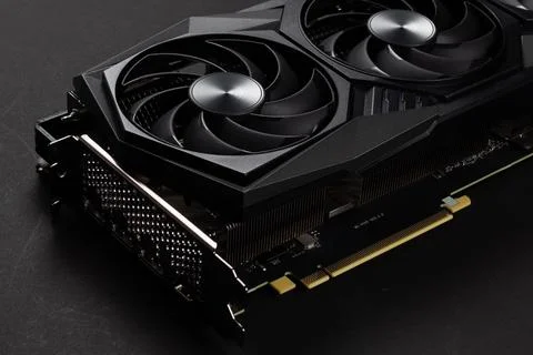 A close up of a modern GPU Graphic card on dark background. Stock Photos