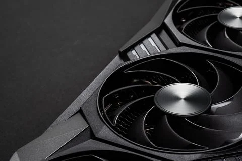 A close up of a modern GPU Graphic card on dark background. Stock Photos