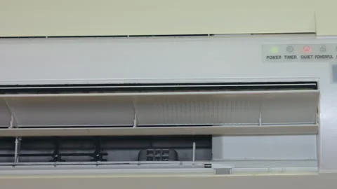 Close-up of Modern Indoor Air Conditioner Airflow Vents Moving Slowly Stock Footage 339629115