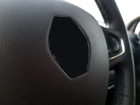 Close-up of a modern leather-covered steering wheel Stock Photos