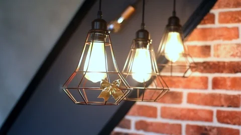 Close up of modern loft lamp lights with brick wall on background. Interior 스톡 동영상 126284435