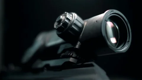 Close-up of a modern optical and collimator sight on a modified carbine Stock Footage 144068924